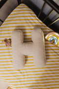 Boucle letter cushion H Teddy pillow by bettys home lying in kids crib next to maileg mouse and rainbow kids lamp