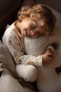 cute little boy hugging Boucle letter cushion B teddy pillow by bettys home kids room deco idea