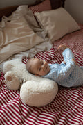 little baby boy lying on boucle letter cushion J teddy pillow by bettys home gift idea