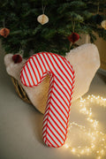 Christmas candy cane cushion red stripes by bettys home under christmas tree. Candy cane Pillow Candy