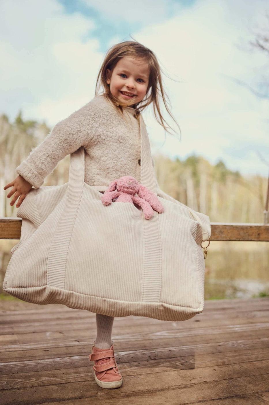 Young girl with corduroy bag by bettys home in cream. Tote bag.