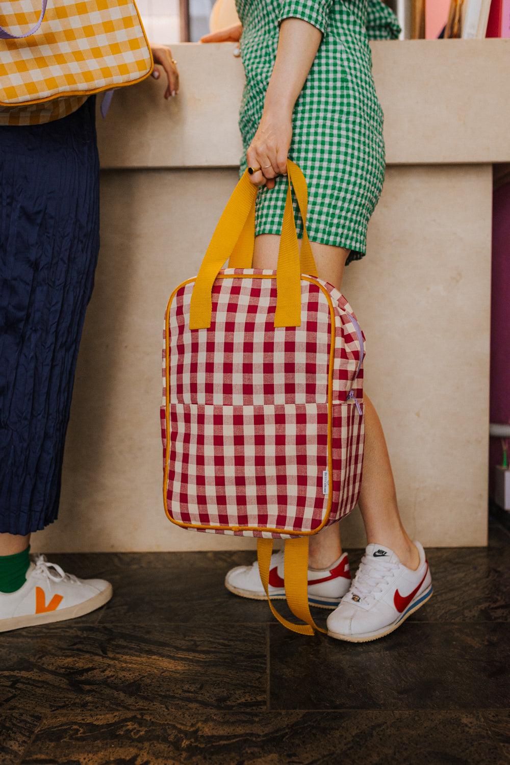 Red checkered backpack on sale