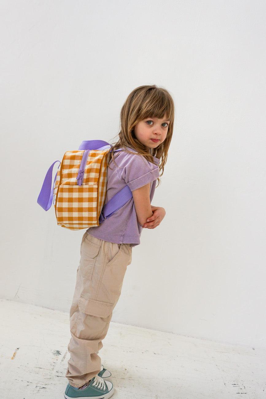 cute little girl with yellow gingham backpack by bettys home