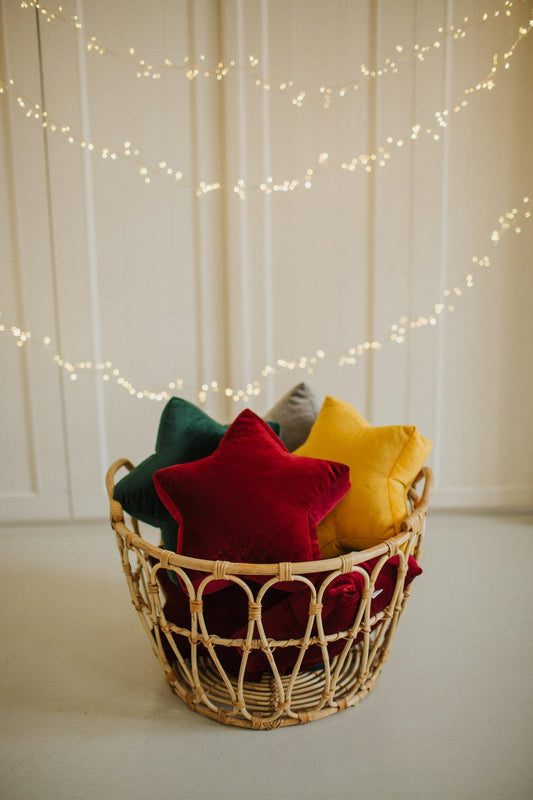 velvet small star cushion wine red by bettys home with yellow star and green star in basket