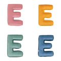 velvet letter cushions e in four colours by bettys home