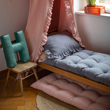 velvet letter cushion h mint by bettys home standing on small chair next to bed with cotton canopy