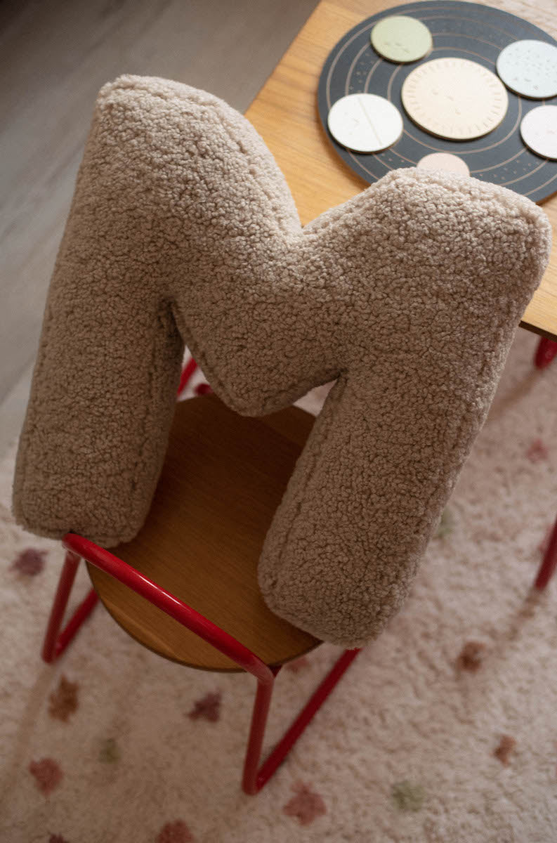 boucle letter cushion M mocha by bettys home on kids chair