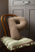 boucle letter cushion mocha by bettys home. kids room deco idea. teddy cushion mocha