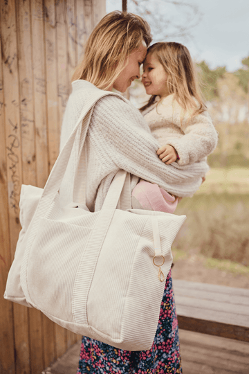 mom with her daughter and corduroy shopper bag by bettys home