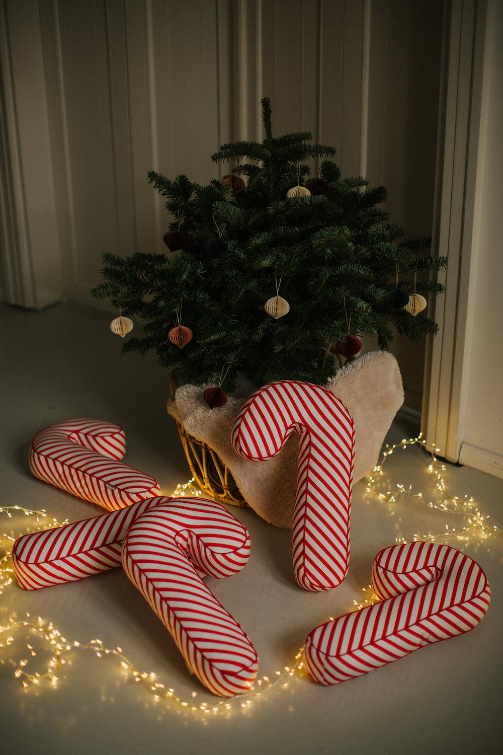 Christmas candy cane cushion red stripes by bettys home few of them under christmas tree. Candy Cane Pillow Pottery Barn