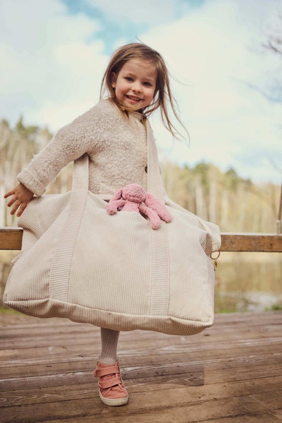 Young girl with corduroy bag by bettys home in cream. Tote bag.