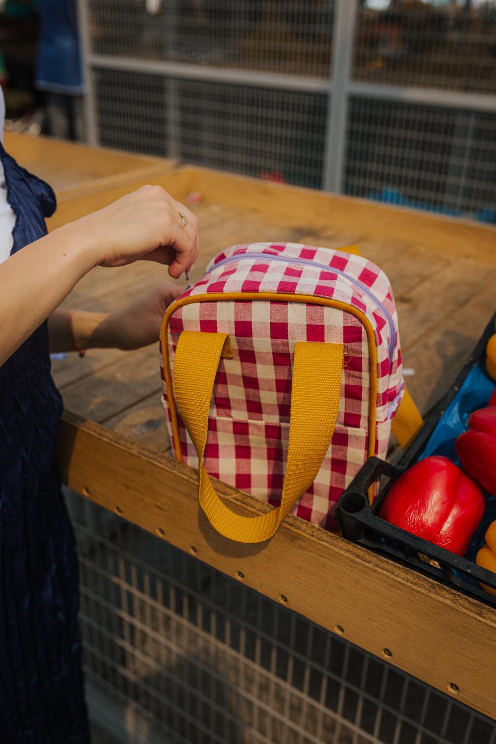 ladies backpack small in red. Small checkered backpack