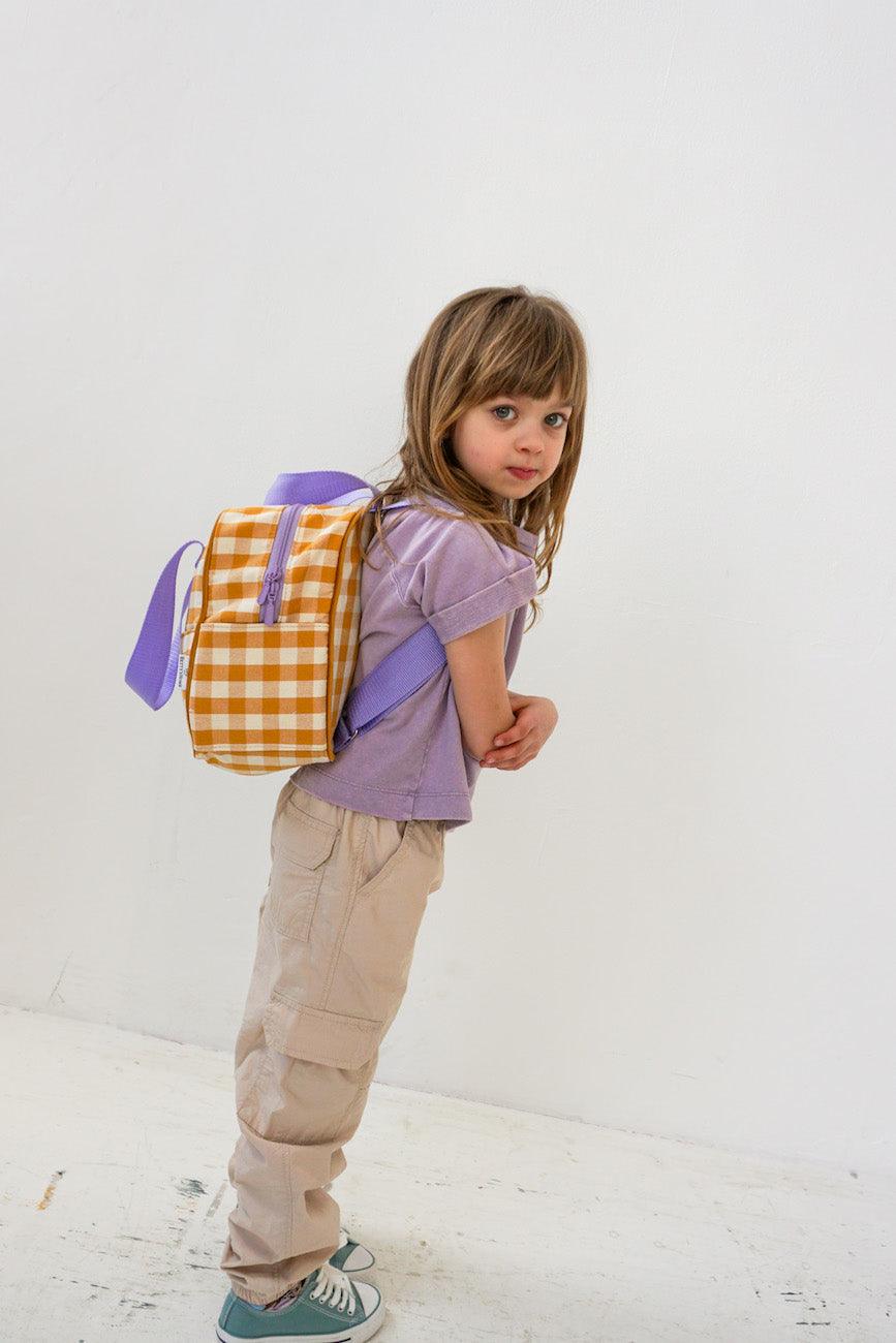 cute little girl with yellow gingham backpack by bettys home 