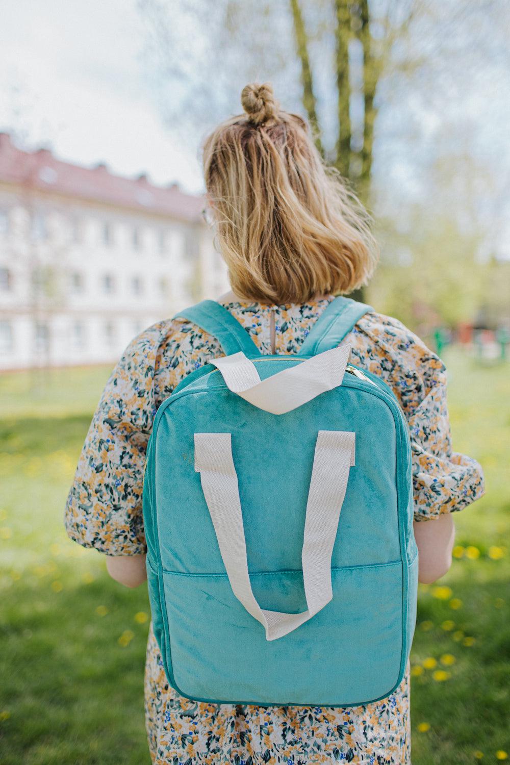 woman in park with velvet backpack by bettys home. backpack for laptop women’s 