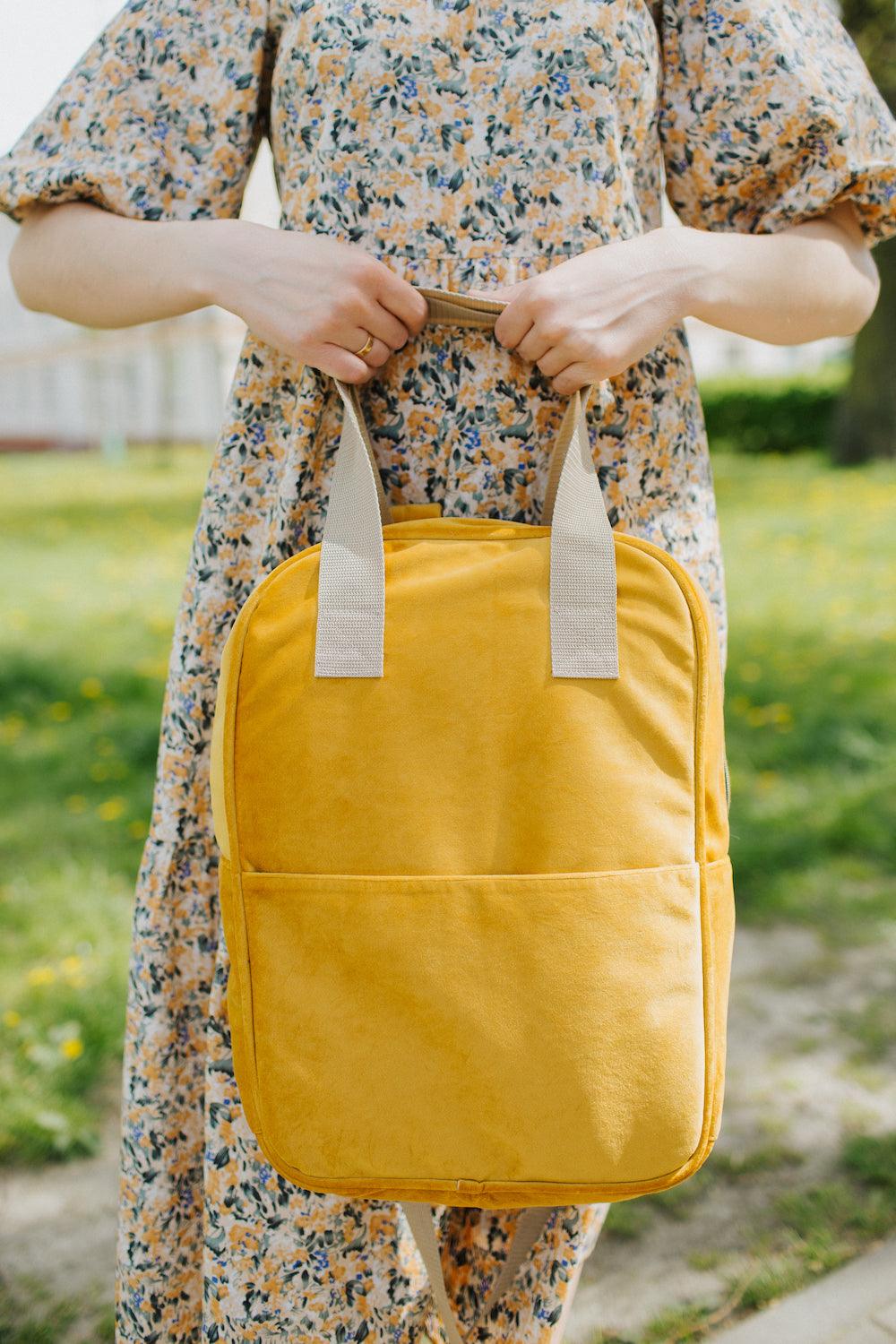 woman with yellow velvet backpack by bettys home ladies backpack for work 