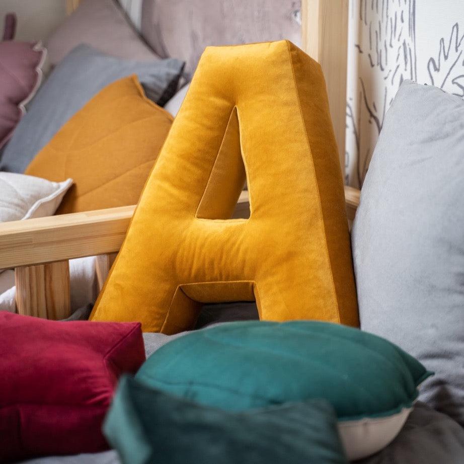 Velvet letter cushion A yellow by Bettys Home on kids bed in beautiful decorate kids room 