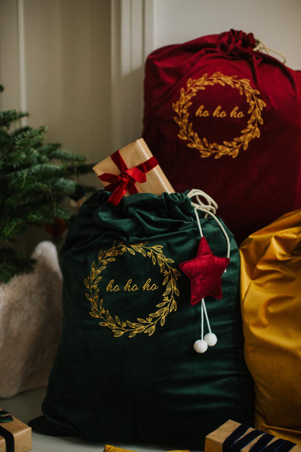 velvet little star pendants wine red by bettys home on christmas sack in green with gifts near to christmas tree