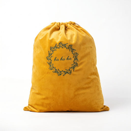 Saco navideño en terciopelo amarillo | Bolsas navideñas para regalos.