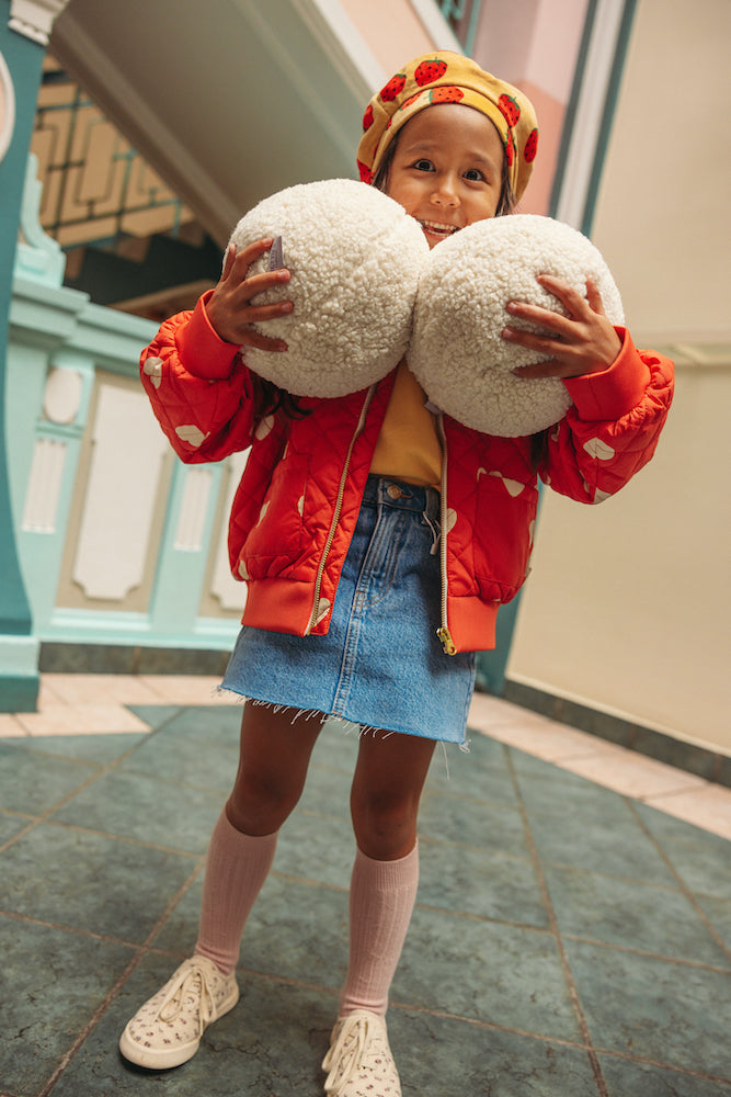 girl in school with boucle ball cushions by bettys home. Ball shaped cushion. Boucle Ball Pillow 