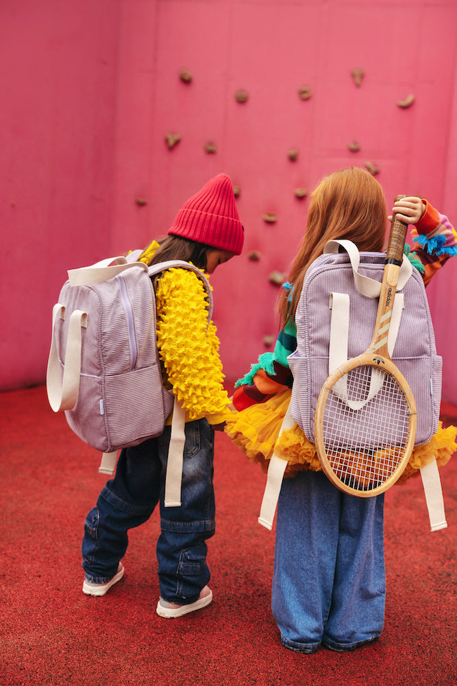 two little girls on playground with corduroy backpack in lilac by bettys home. Lilac Corduroy Backpack 