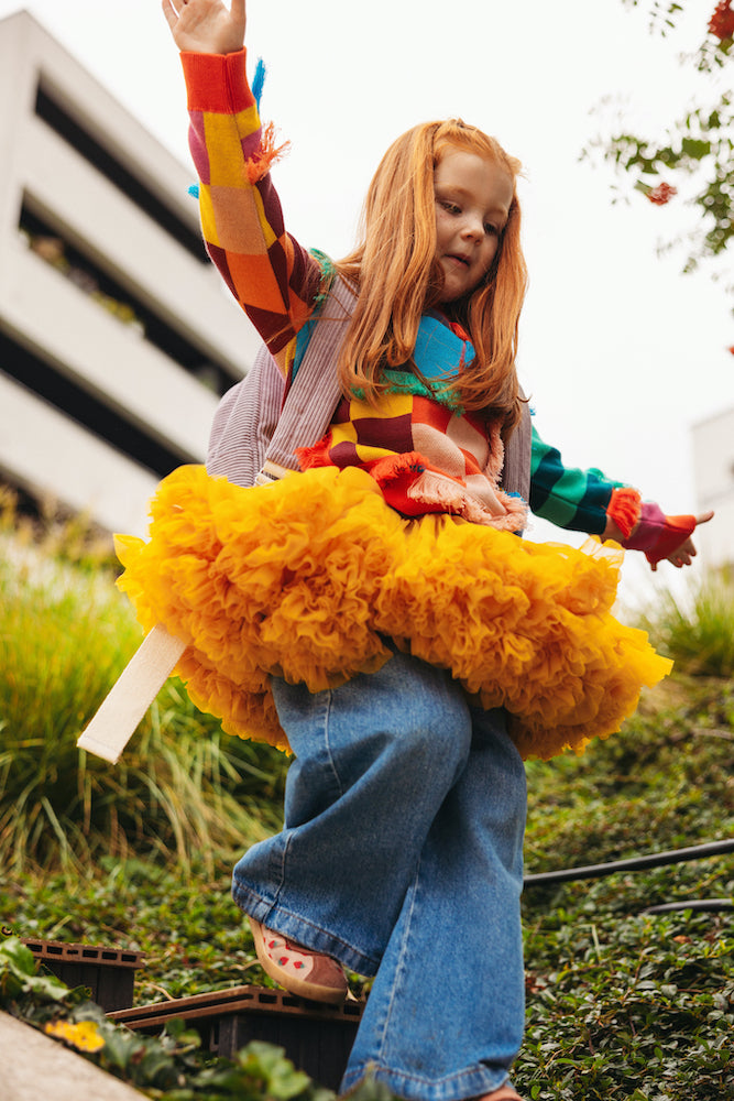 little girl playing outside with corduroy backpack by bettys home 