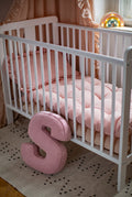 corduroy letter cushion S by bettys home in kids room on floor. Cushion in shape of letter