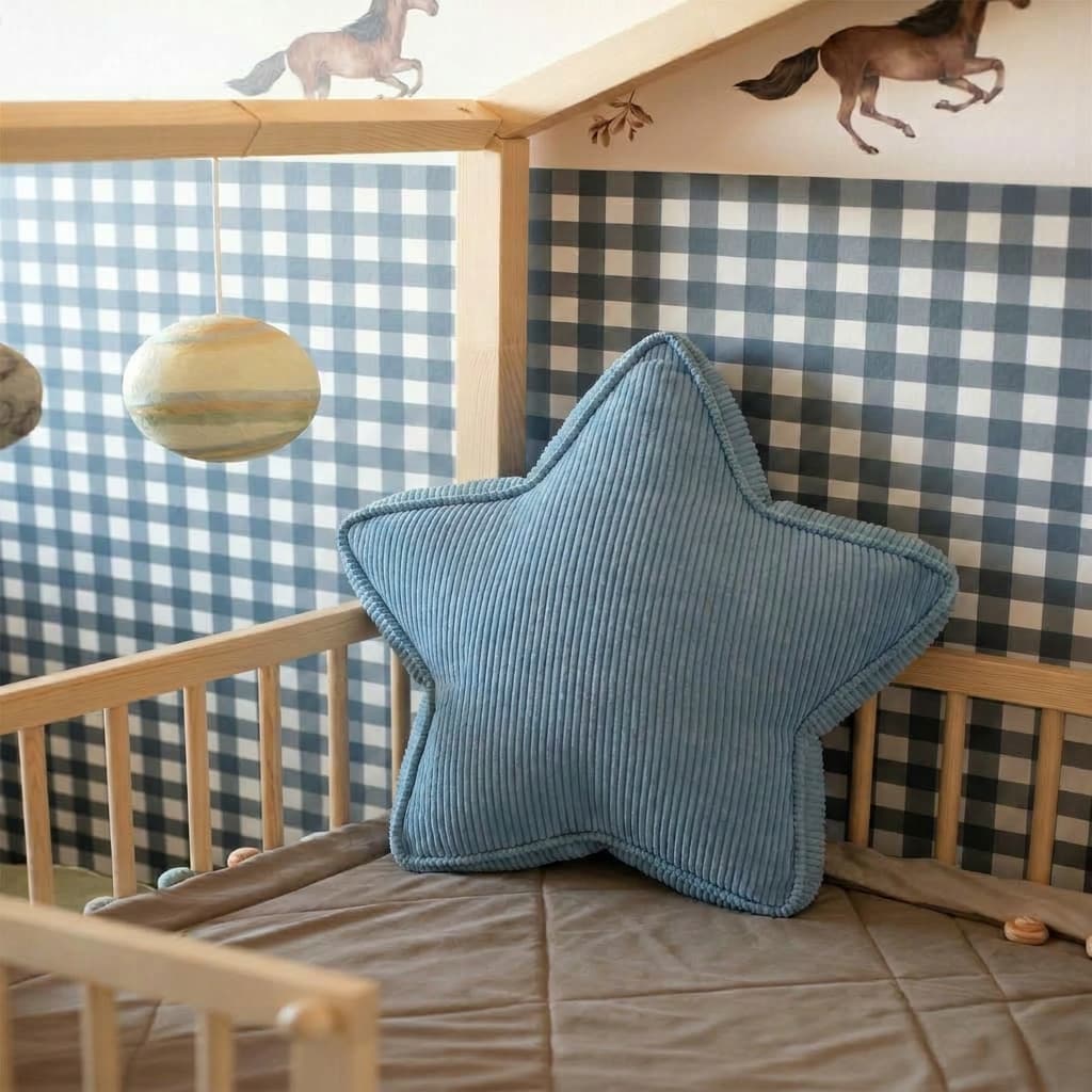 Blue corduroy star pillow in checkered nursery with horse wall mural by Bettys Home