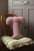 corduroy letter cushion T by bettys home in kids room on chair. Cushion in shape of letter