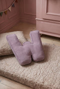 corduroy letter cushion W by bettys home in kids room on boucle mattress. Cushion in shape of letter