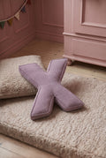 corduroy letter cushion X by bettys home in kids room on boucle mattress. Cushion in shape of letter