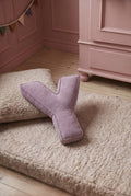corduroy letter cushion Y by bettys home in kids room on boucle mattress. Cushion in shape of letter