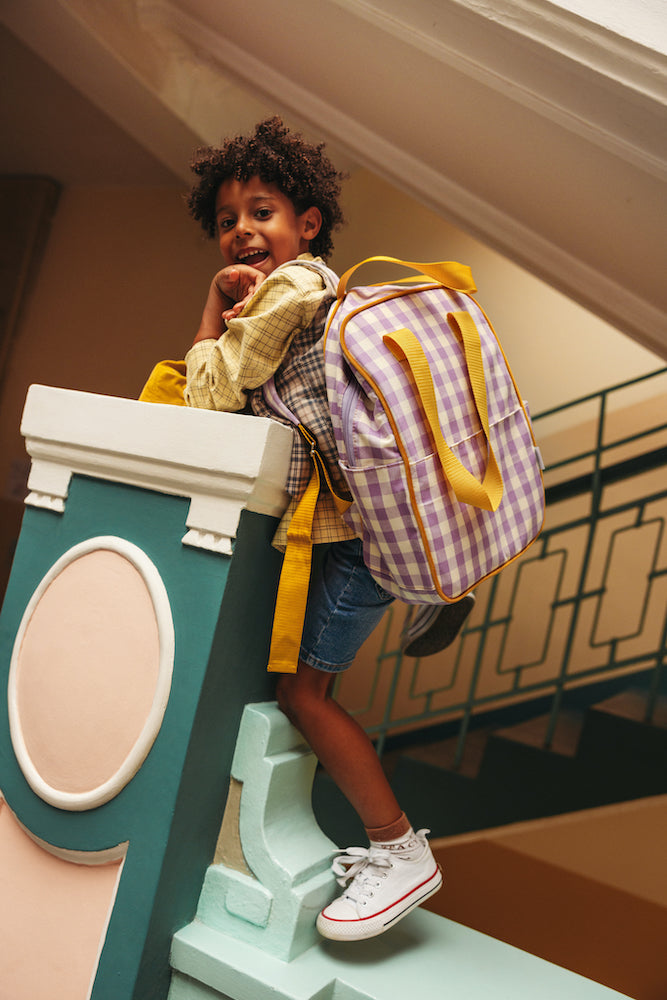 young boy in school with gingham backpack lilac by bettys home. Gingham Backpacks