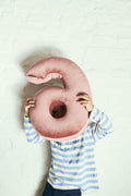 velvet number cushion 6 by bettys home hold by little boy. Cushion in shape of number