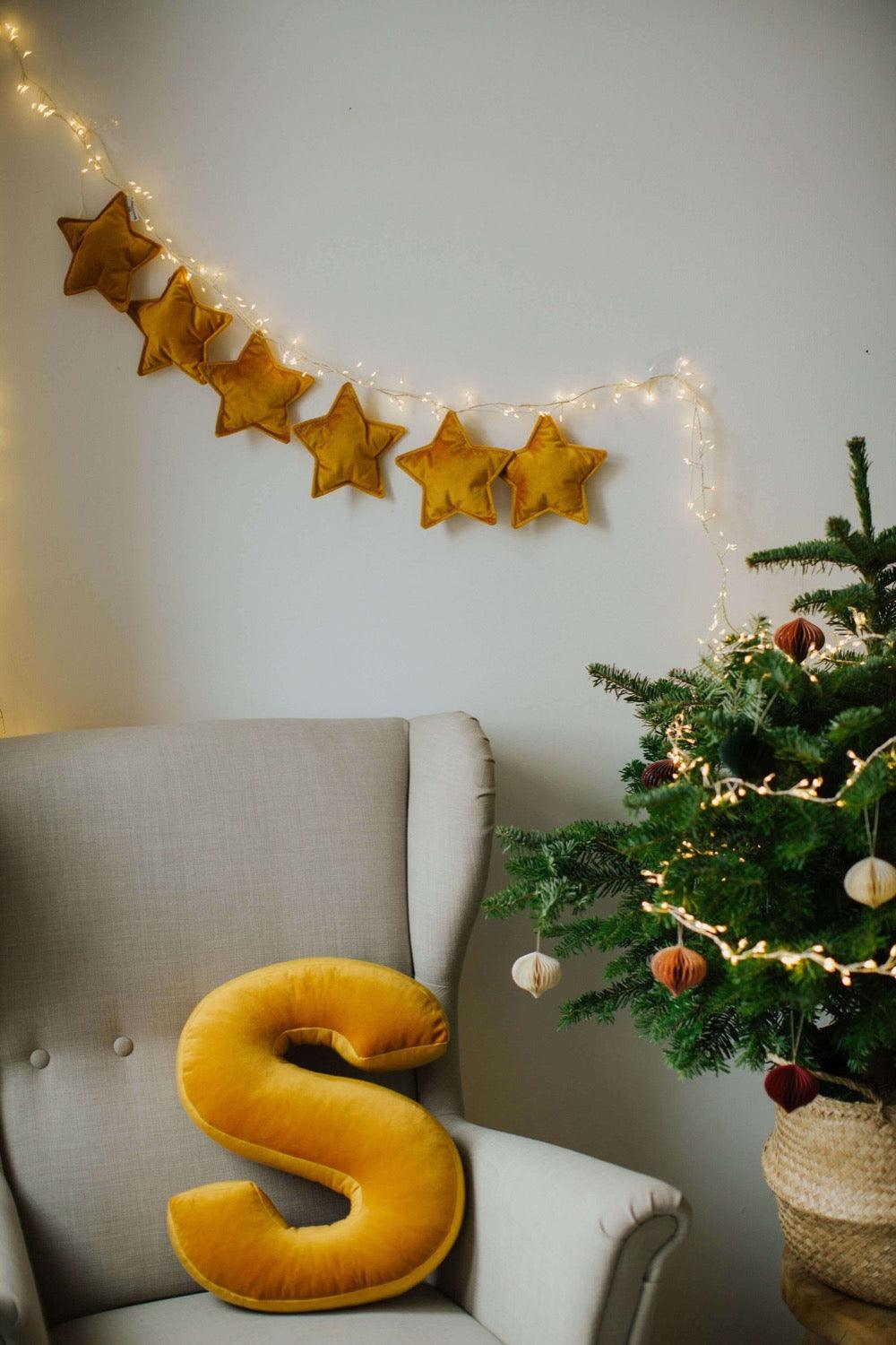 Velvet Star Garland Yellow by bettys home over chair with velvet letter cushion S yellow